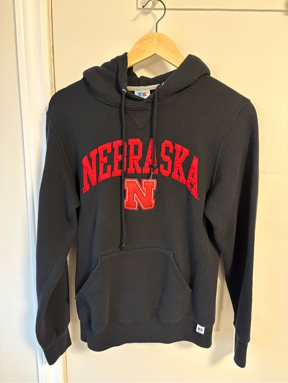 Russell Athletic Black Hoodie with Red Nebraska Logo